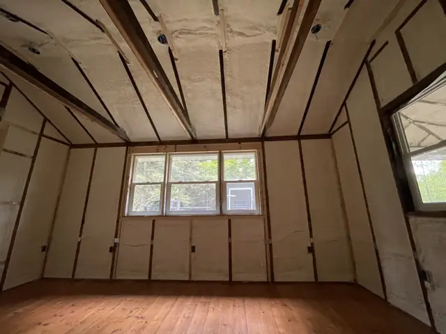 Cabin room with sprayed walls and ceiling