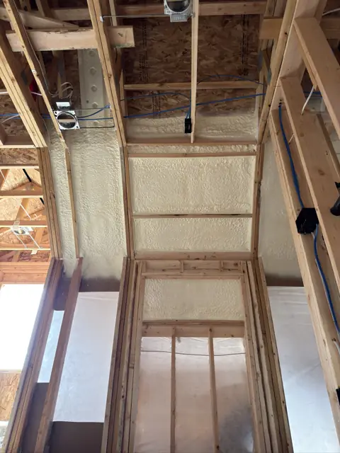 New build gable wall and ceiling sprayed